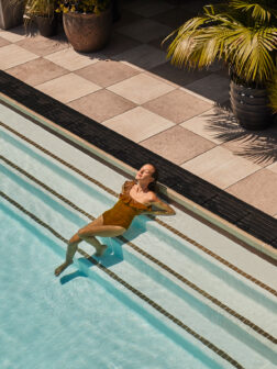 Girl swimming in Santa Monica Proper rooftop pool